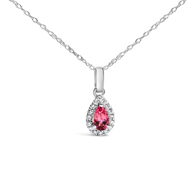 Drape elegance around your neck with this enchanting 10K white gold pendant necklace, where a luscious pear-shaped pink...