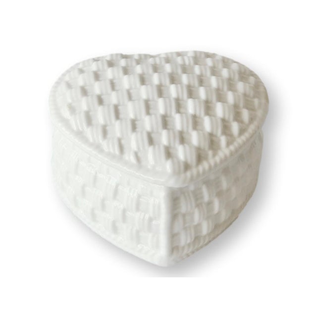 Charming Tiffany and Co porcelain trinket or ring box in a heart shape with basketweave design. Created by renowned Irish...