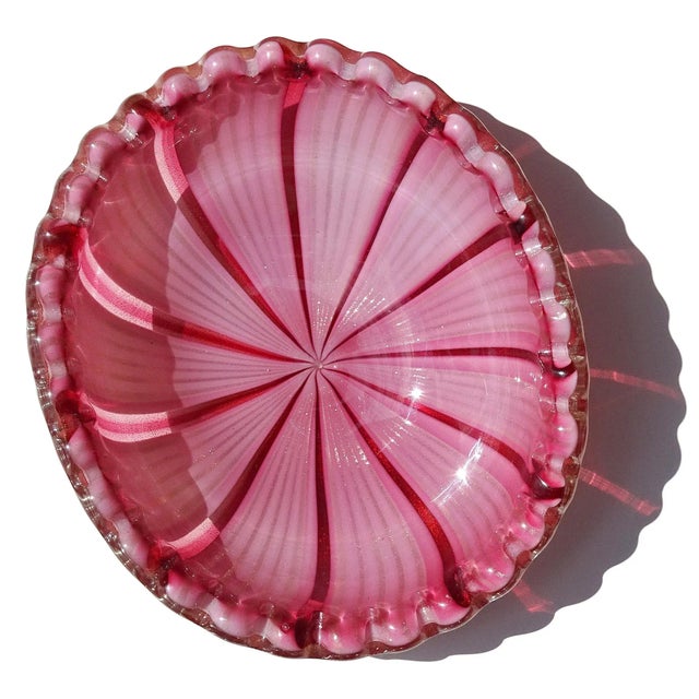 Gorgeous vintage Murano hand blown pink, aventurine and gold flecks Italian art glass decorative bowl. The bowl has an...