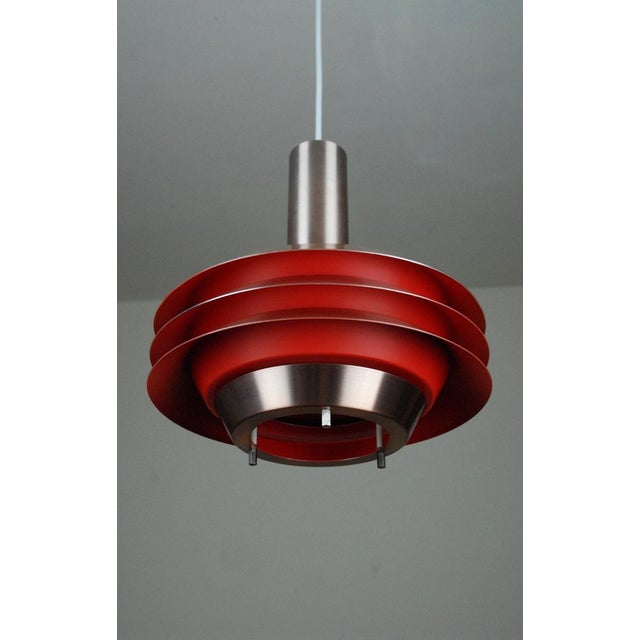 LB Model 705. Made of Aluminium with a brass coloured paint. I have official proof of authenticity such as vintage...