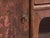 This antique painted low cabinet in pine wood is a Chinese kang cabinet with three drawers, two painted doors and an open...