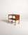 "Thea" serving trolley designed by Yngve Ekström, 1960s, in oak and teak, with a black laminate central shelf and drop-...