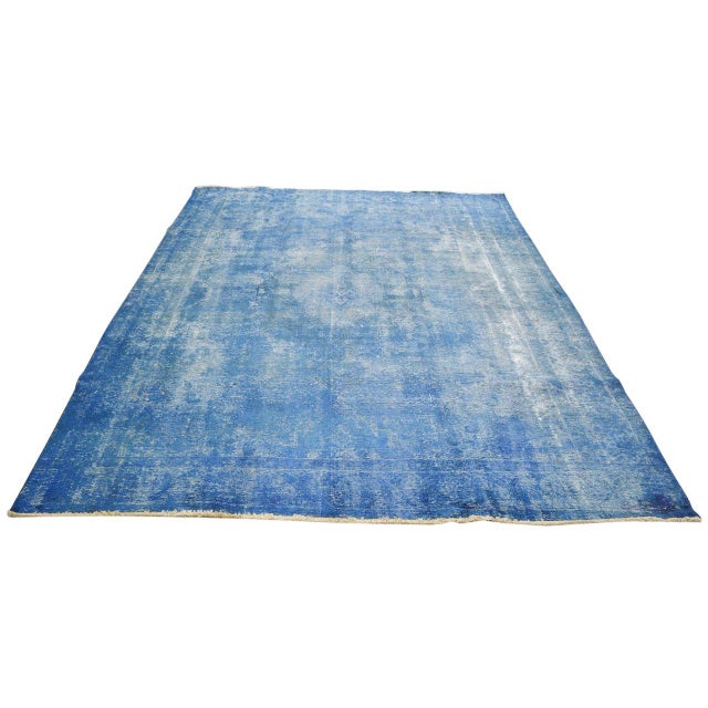 Vintage Hand-knotted with care using traditional rug-making techniques, this wool rug blends timeless craftsmanship with a...
