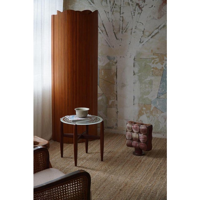 Side table in teak & a beautifully decorated top in glass. Made by a skilled Danish cabinetmaker in the 1960s. This...