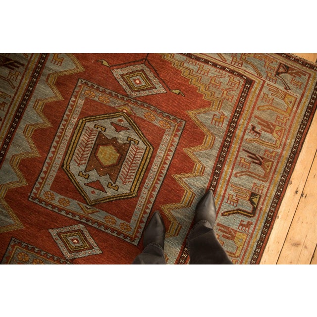 :: Triple center medallion in hexagonal relief inside squared border minor carpet design like panels wrapped by geometric...