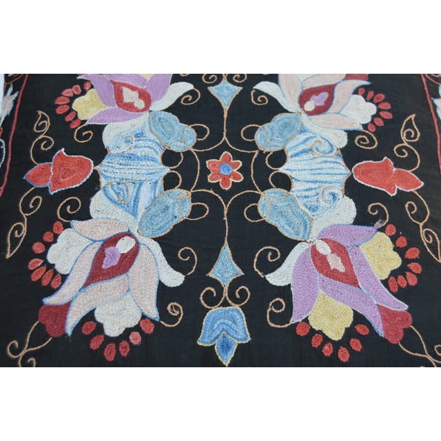 One-of-a-kind vintage tribal pillow finely woven design with an intricate combination of floral and geometric symbols....