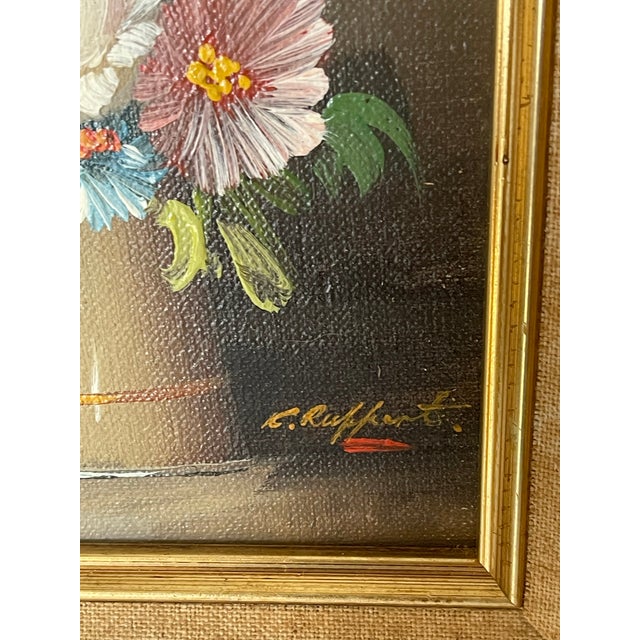 Small floral lovely painting oil on board , signed and framed.