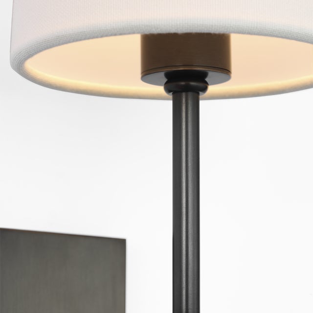 Camille 16" Sconce in Bronze with Linen Shade Designer: Suzanne Kasler Finish: Bronze Height: 16" Width: 4.75" Extension:...