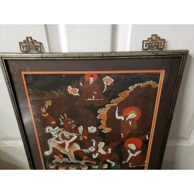 This is a Late 19th Century Tibetan Buddhist Wrathful Deity Begtse Framed Painting. The frame measures 22 3/4" high and 16...