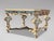 20th-Century Italian Baroque Carved and Painted Coffee Table, Labelled Harrods A decorative Italian Baroque style coffee...