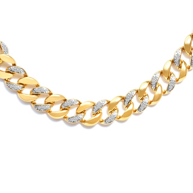 Immerse yourself in the opulence of this exquisite necklace, where classic design meets striking allure. Each link, finely...