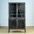 Medical cabinet from the 1930s, made in Hungary. This cabinet is made of iron and glass, creating a robust industrial...