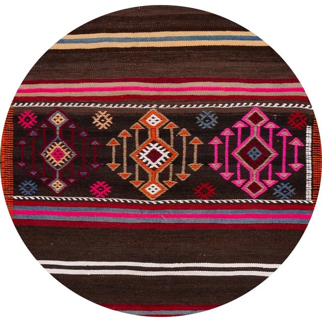 A beautiful vintage kilim runner with an all-over multi-color motif. This piece has fine details, great colors, and...