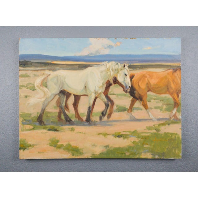 This oil on canvas depicts a serene scene of horses in motion, their bodies gracefully intertwined as they gather in a...