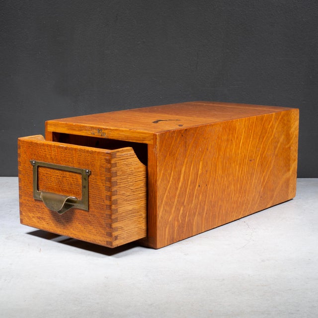 ABOUT An original Oak two-drawer index card catalog from Globe-Wernicke, circa 1920s. This vintage filing system features...