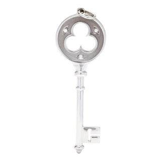 1980s Tiffany & Company Diamond Trefoil Key Pendant, 18k White Gold, Length 2.25 Inch For Sale