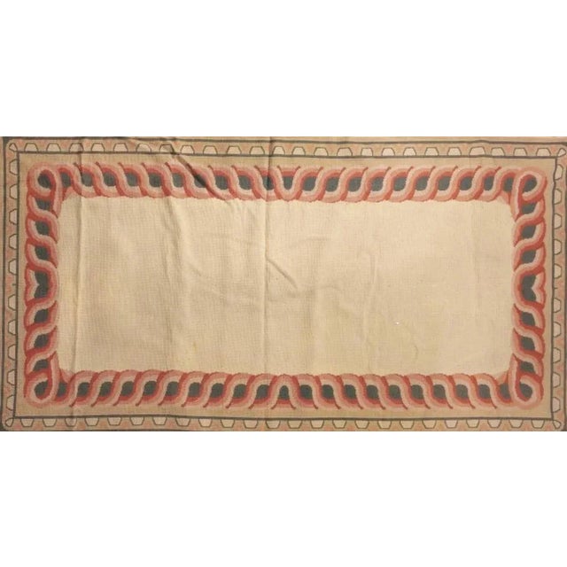 Portuguese rug " Arraiolos " in wool yarn with polychrome decoration in shades of pink and blue. Signs of use. 20th...