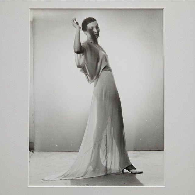 Woman photographed by man ray. A posthumous print from the original negative around 1970 by pierre gassmann. Gelatin...