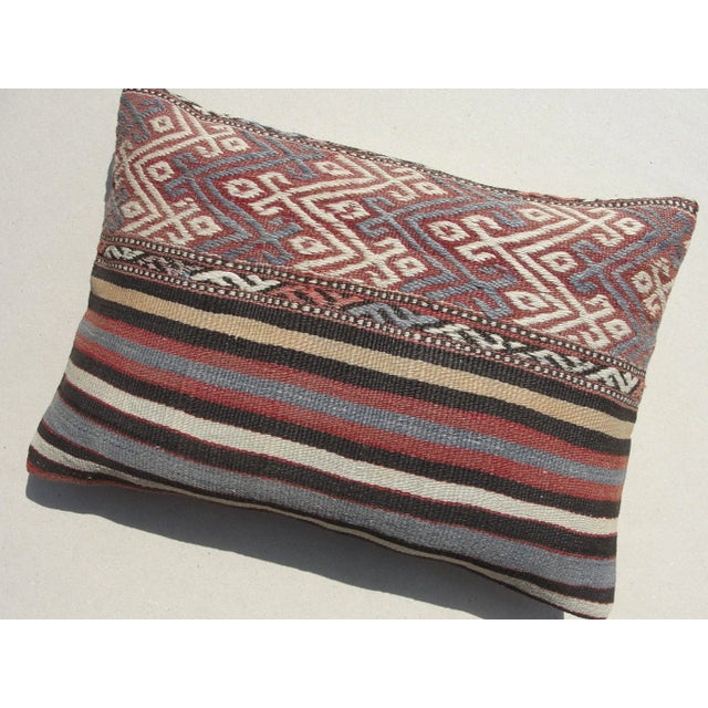 Kilim Rug Pillow Made from old turkish kilims Back side cotton and has closed with a solid hidden zipper size14" x 20" It...