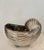 Just in this mid-century Hollywood Regency style centerpiece . It is beautifully cast into a very realistic Nautilus Shell...