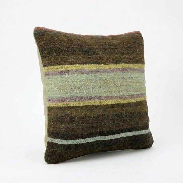 This beautiful 16'' x 16'' Turkish Kilim pillow cover was made from authentic handwoven flatweave kilim. The traditional...