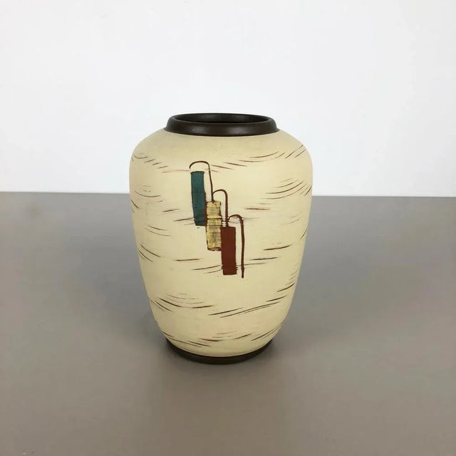 Article: Pottery ceramic vase Producer: Sawa Ceramic, Germany Design: Franz Schwaderlapp Decade: 1960s Description:...