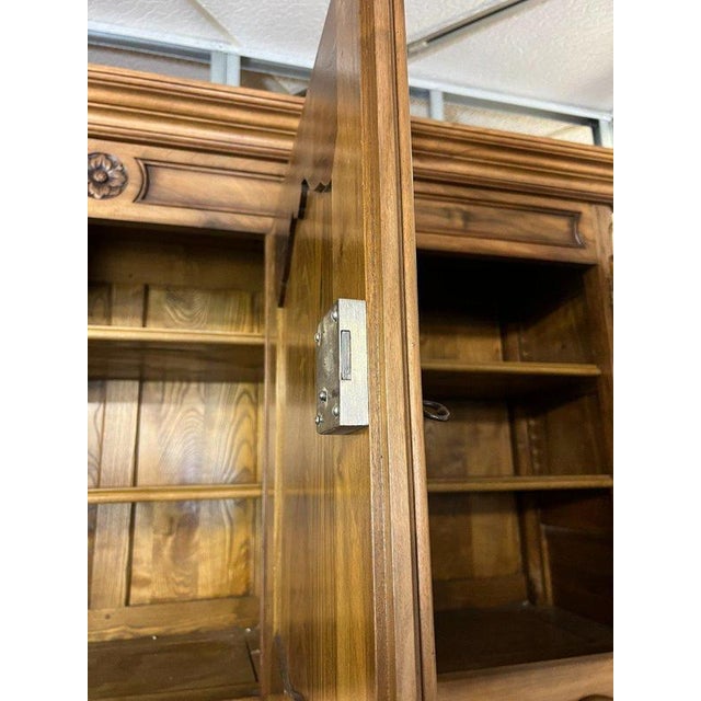 Very large Louis XV style sideboard in solid cherrywood, 20th century period. front opening with 8 doors and 3 drawers,...