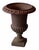 Set of three antique, early 20th century cast iron Campagna form garden urns. Egg and dart motif on the rims and melon...