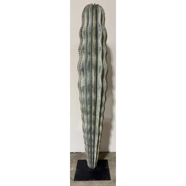 Orenzo metal sculpture from Marrakesh. Very realistic finishes on black base. Approximately 62" tall and 12" wide. Black...