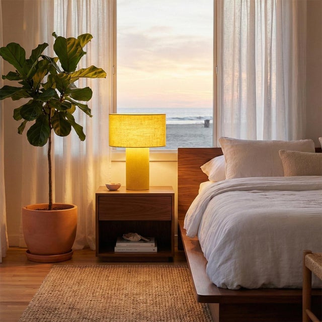 The Moonlight Table Lamp by Nova of California is a contemporary designer lighting piece that blends sculptural form with...