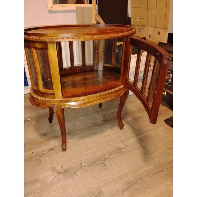 Georgian style Chocolate / Tea table or vitrine cabinet, circa last quarter 20th century. Features an oval frame and tray...