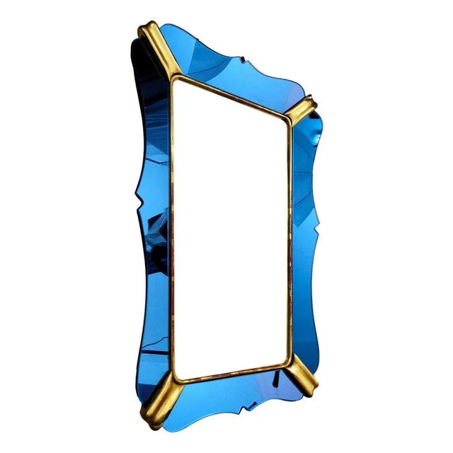 Rare collector's mirror, designed by Gio Ponti, produced by Luigi Fontana for Fontana Arte, 1940s. wooden structure, blue...