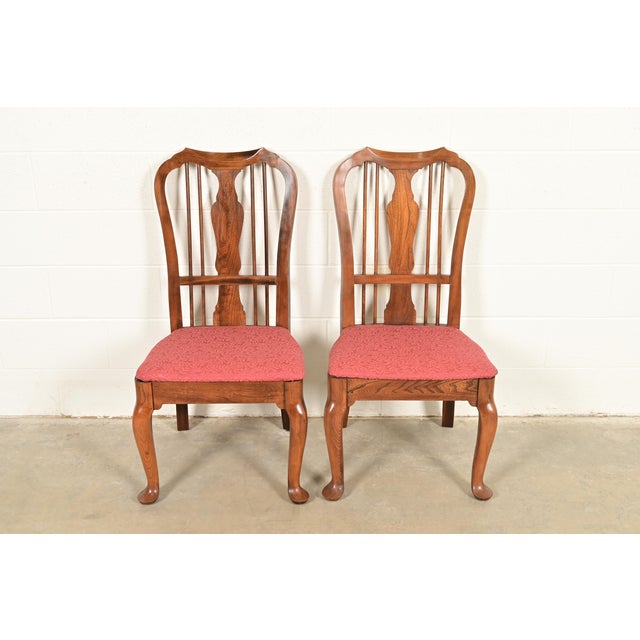 A gorgeous pair of Queen Anne or Georgian style side chairs or dining chairs In the manner of Baker Furniture By Blowing...