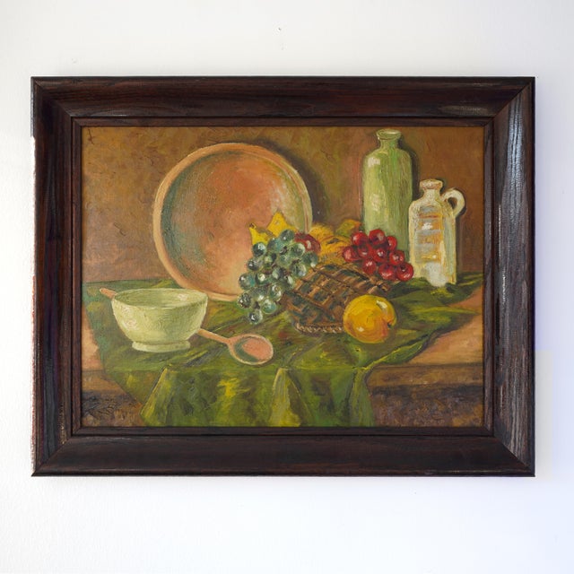 Vintage original oil still life painting in original primitive wood frame. A warm and inviting vintage still life painting...