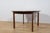 This extendable dining table was produced by G-Plan in the 1960s. Teak elements cleaned old coating and painted rosewood...