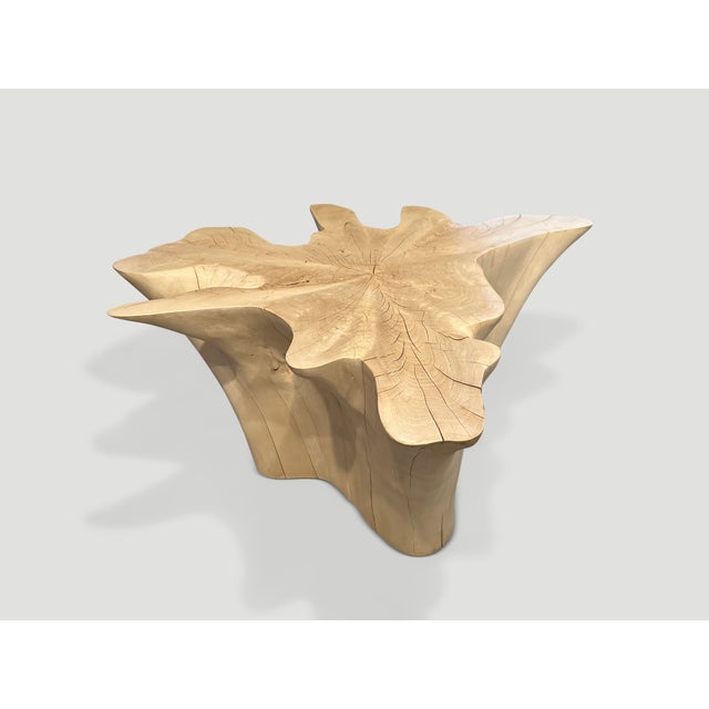 Impressive reclaimed bleached teak amorphous coffee table. A graduation from the bottom to the top. We have added a polish...