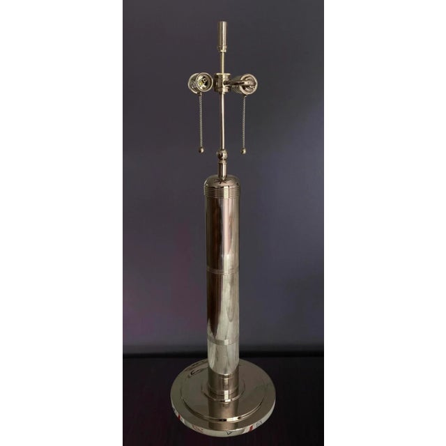 Discover the refined elegance of the Visual Comfort Signature Collection’s Longacre Tall Table Lamp, masterfully designed...