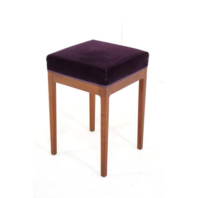Nice set of 4 vintage stools. Made of solid teak with a velvet purple seat, these stools immediately catch the eye, they...