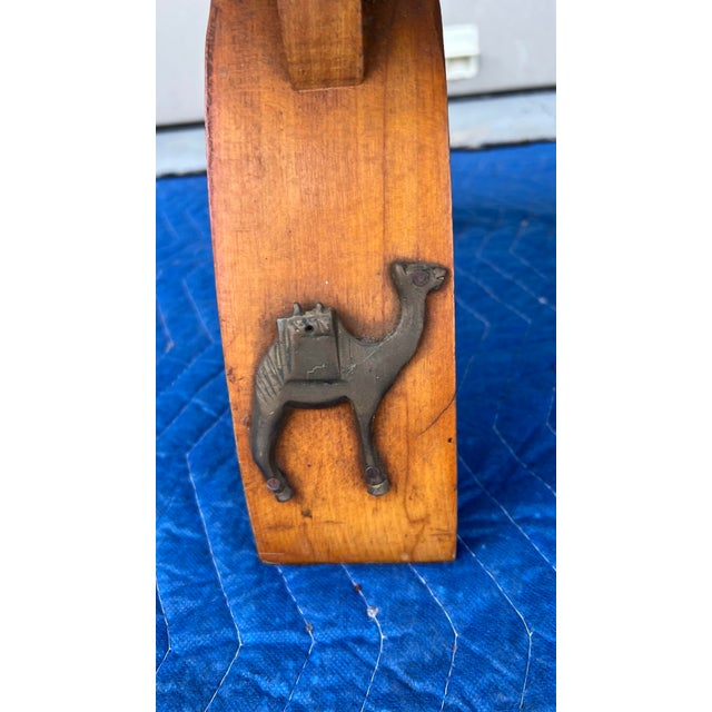 A Vintage Egyptian Camel Footstool/Ottoman, With Green Leather Seat, 1960's Most likely made in Egypt, circa 1960-1970's...