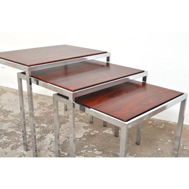 1960s mimi set by cees braakman for pastoe. Beautiful, refined chrome bases. The tops can be rotated from rosewood to...