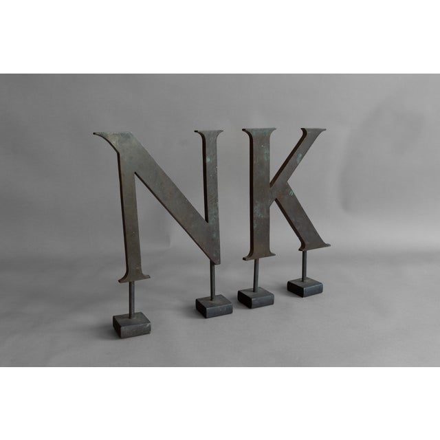 Solid brass shop sign letters on newly manufactured steel bases. U.K circa 1900.