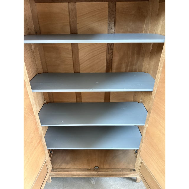 With its majestic presence and meticulous details, this art deco oak wardrobe captivates with its balance of clean lines...