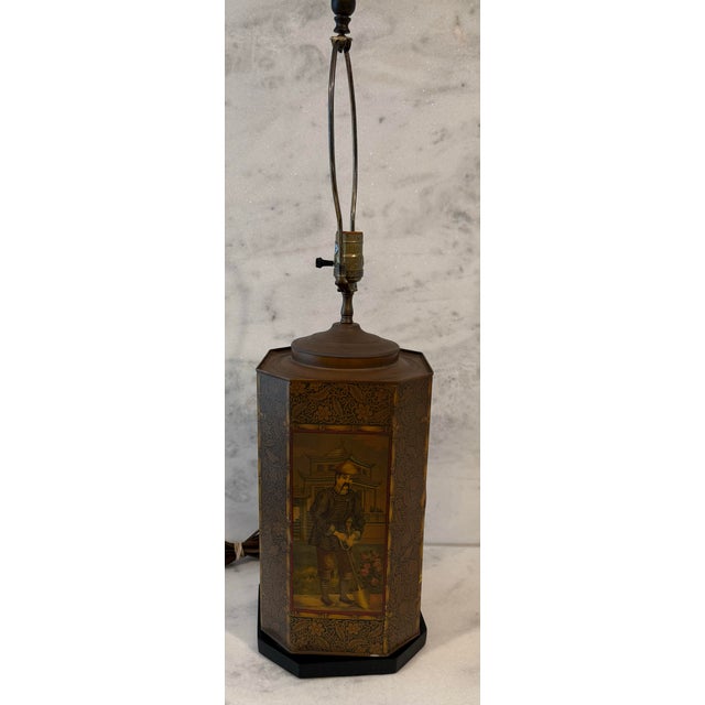 Vintage octagonal tea canister table lamp made my Chapman circa 1970s. Chinoiserie themed design with a tole canister and...