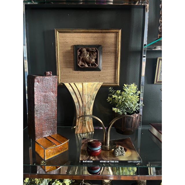 Stunning Hand-Crafted Rectangular Pottery Vessel. It features an etched design throughout and a glazed finish. The color...