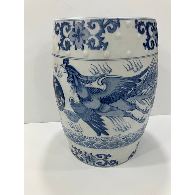 This hand painted ceramic garden seat features a dragon and phoenix design The very solid ceramic can be used inside and...