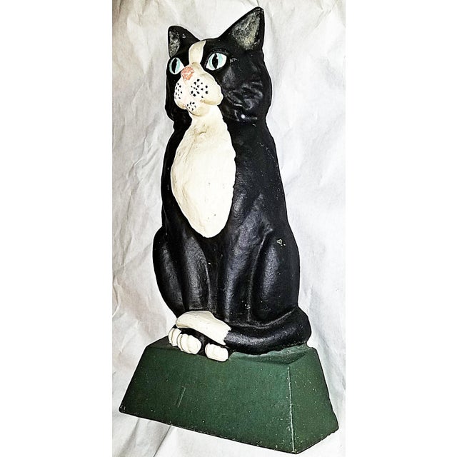 Who wouldn't want this tuxedo gentleman as doorman? This vintage cast iron doorstop kitty cat is made in Canada by Great...