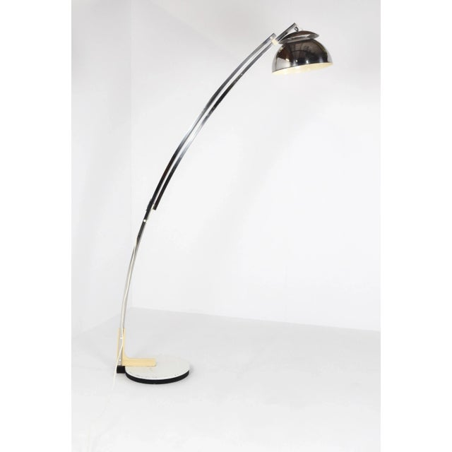 Original Goffredo Reggiani Adjustable Chrome Arc Floor Lamp from Italy late 1960's or early 1970's. It is produced by the...