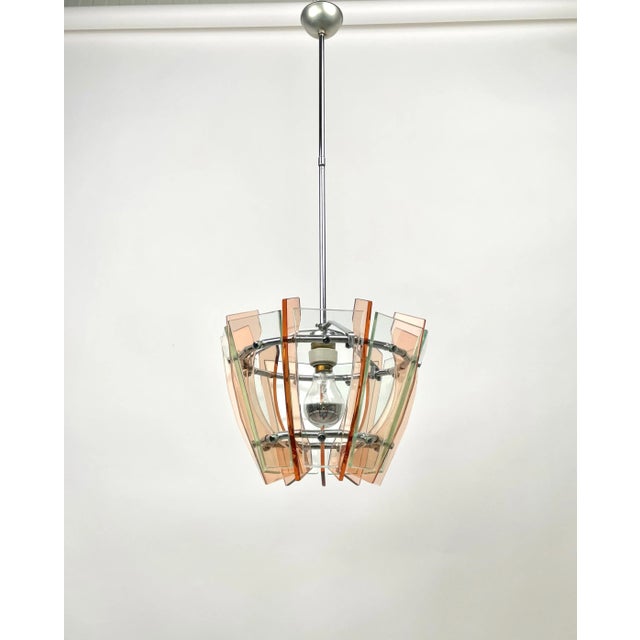 Chandelier pendant in colored glass (green & orange) and chrome by Veca, Italy, 1970s. Measures: Height with pole: 80 cm...