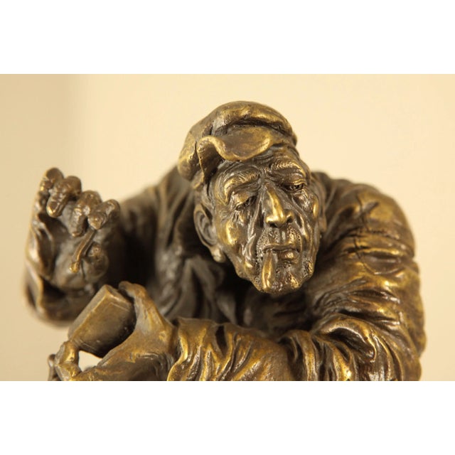 Realism Atlie Bronze Figure of an Older Man Crouching, Reading, Striking Match For Sale - Image 3 of 13