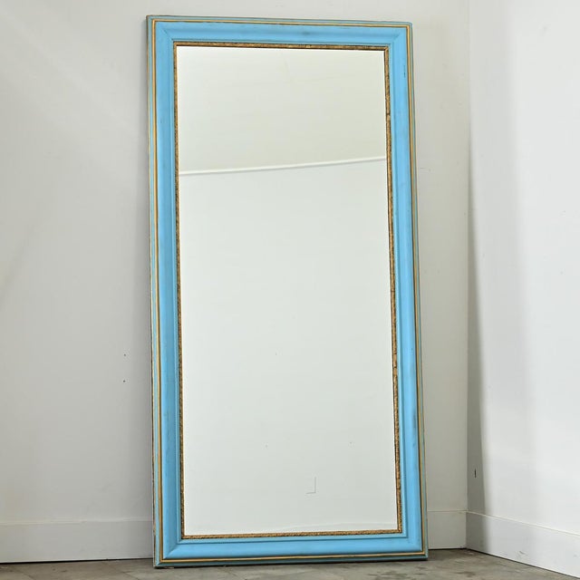 This classic French mirror from the 19th century was more recently given a personalized updated with bright blue paint for...